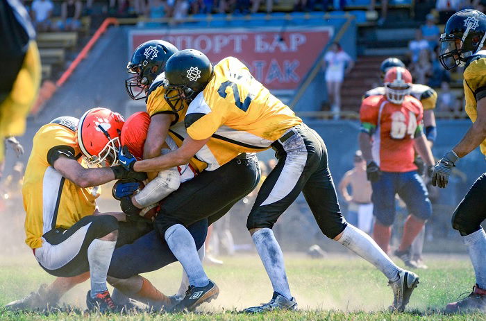 Players getting rough playing American football